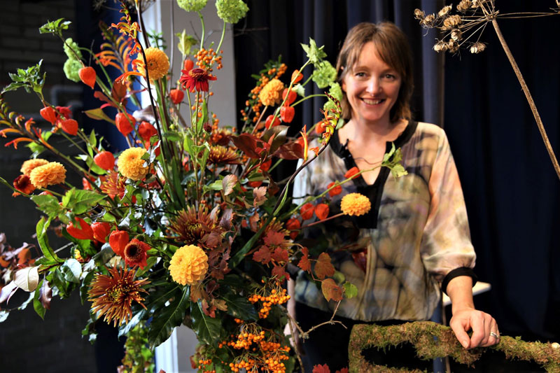 A photo taken at NAFAS Cheshire's 2022 AGM of a demonstration by national demonstrator Alison Penno from Cornwall. The theme was Alison's 'floral idols'