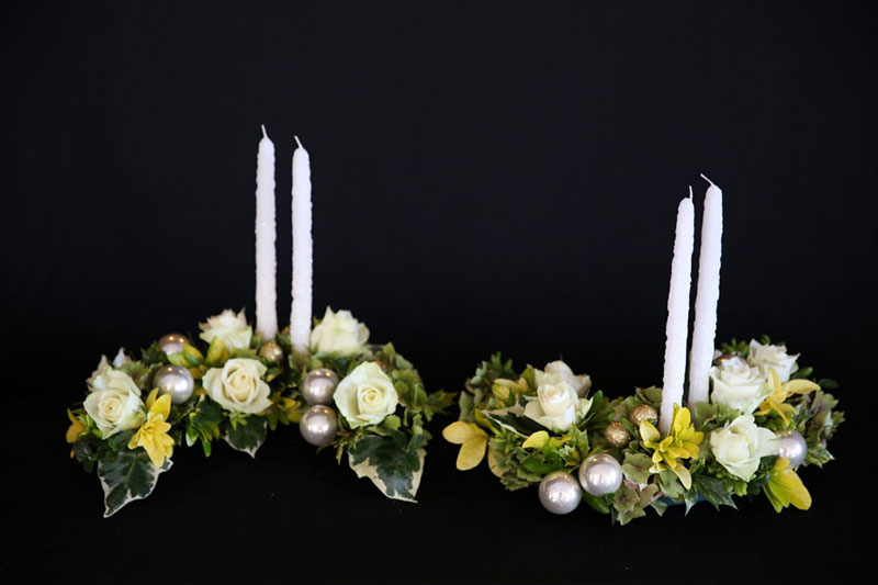 A photo of a Christmas floral arrangement