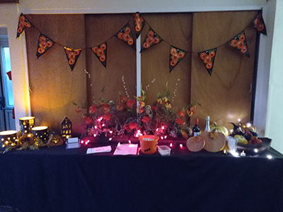 A photo taken at an evening with Mark Entwistle, creating Halloween floral designs, at Hale Barns Flower Club