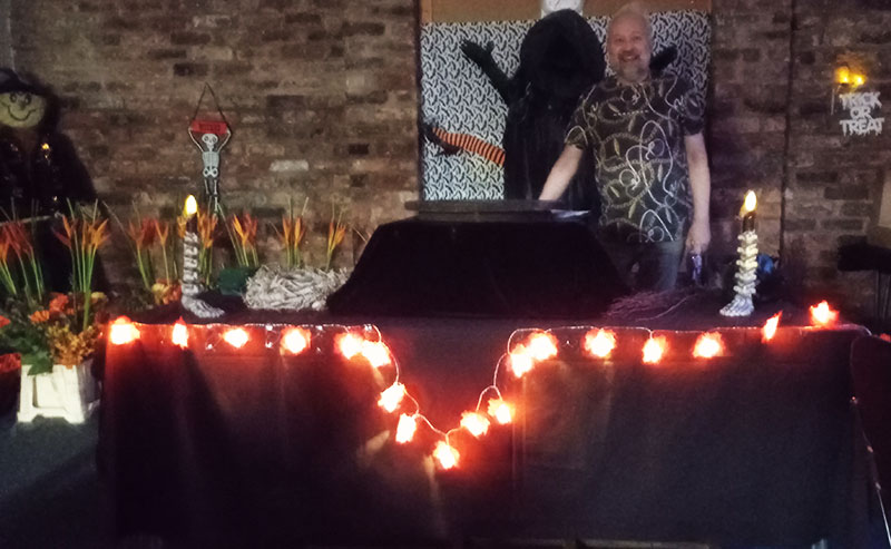 Mark Entwhistle at Hale Barns Flower Club presenting an evening of Halloween floral designs