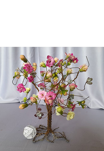 Joan Wilkinson's flower arrangement in the Summer hues class of the Royal Cheshire County 'Virtual' Show 2021