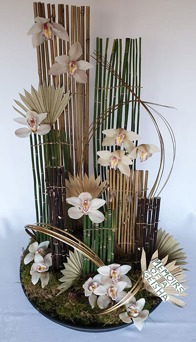 Rachel Bostock's Silver Gilt Award Winning flower arrangement in the Don't judge a book ....  class of the Royal Cheshire County 'Virtual' Show 2021