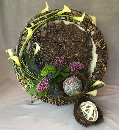 Gill Davies' flower arrangement in the Knit one purl one class of the Royal Cheshire County 'Virtual' Show 2021