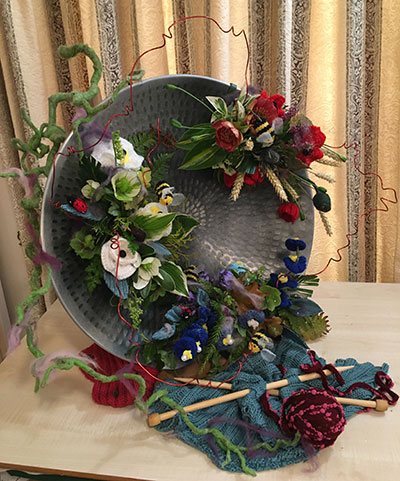 Pat Wood's flower arrangement in the Knit one purl one class of the Royal Cheshire County 'Virtual' Show 2021