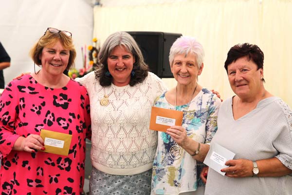 Flower Clubs of Cheshire class award winners with NAFAS National Chairman Nicky Wylie at the 2024 Royal Cheshire Show 