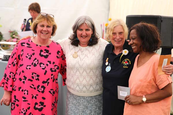 Flower Clubs of Cheshire class award winners with NAFAS National Chairman Nicky Wylie at the 2024 Royal Cheshire Show 