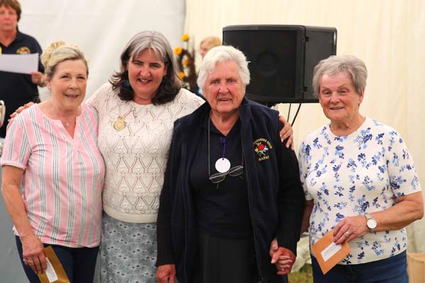 Flower Clubs of Cheshire class award winners with NAFAS National Chairman Nicky Wylie at the 2024 Royal Cheshire Show 