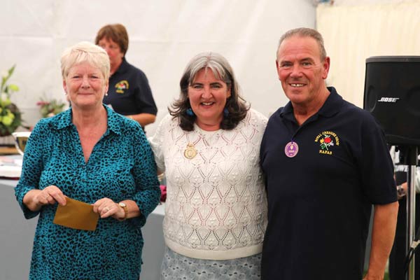 Flower Clubs of Cheshire class award winners with NAFAS National Chairman Nicky Wylie at the 2024 Royal Cheshire Show 