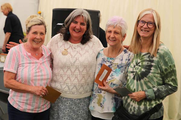 Flower Clubs of Cheshire class award winners with NAFAS National Chairman Nicky Wylie at the 2024 Royal Cheshire Show 