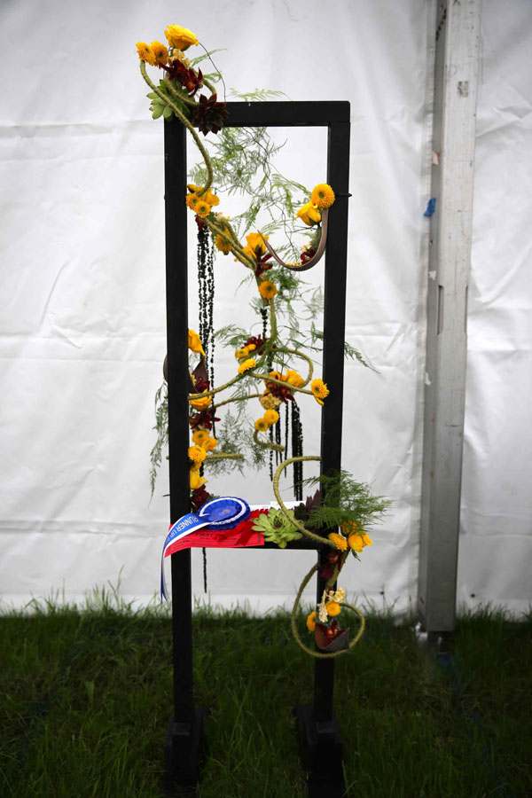 A Flower Clubs of Cheshire  entry in the 					Inside Looking Out class at the 2024		 of the Royal County Cheshire Show 