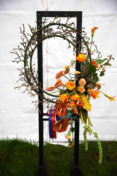 A Flower Clubs of Cheshire  entry in the 	
				Inside Looking Out class at the 2024		 of the Royal County Cheshire Show 